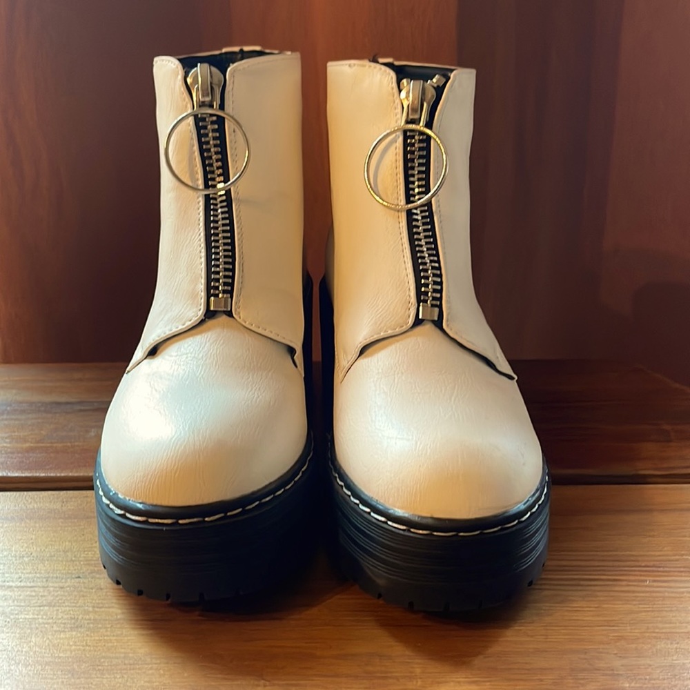 White platform boot with silver hoop detail